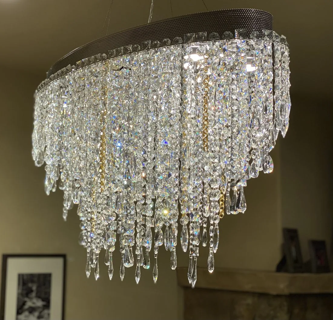 Crystal chandelier above the Keystone Escape dining table